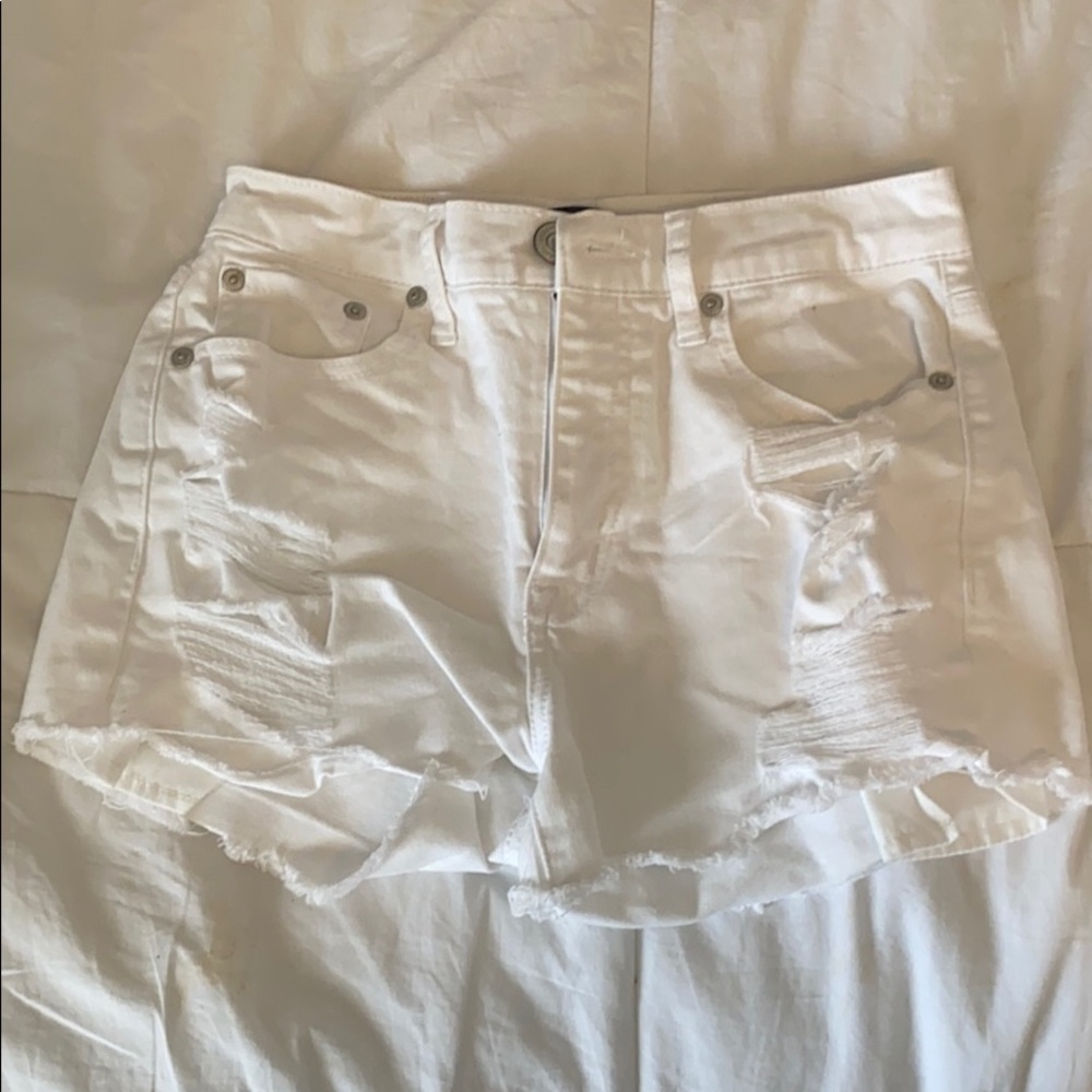white ripped jean shorts